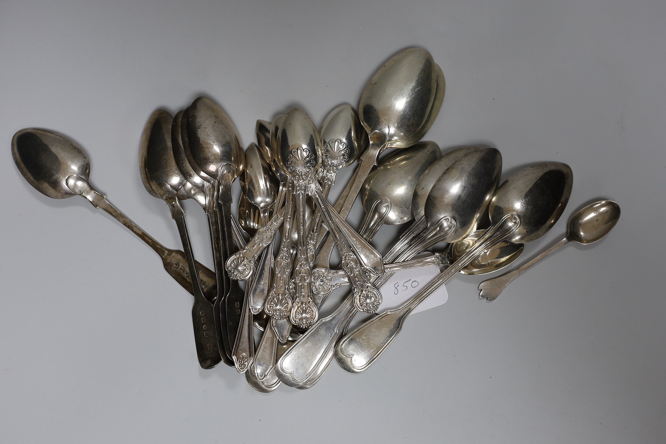 A set of six Victorian silver fiddle pattern dessert spoons, Charles Lias, London, 1845, a set of six silver Queens pattern teaspoons, John James Whiting, London, 1852, set of six later silver grapefruit spoons, three ot